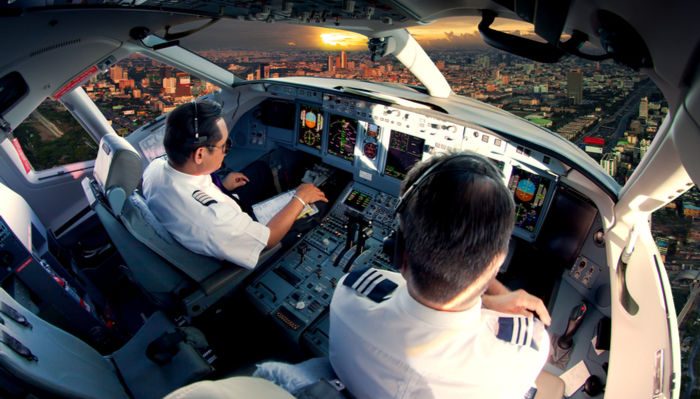 Airline pilots in cockpit