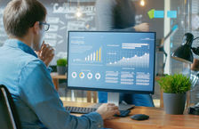 Analyst working on computer