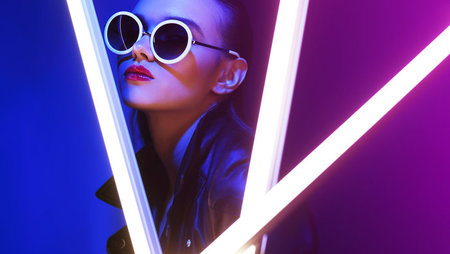 Fashion model wearing sunglasses during photo shoot