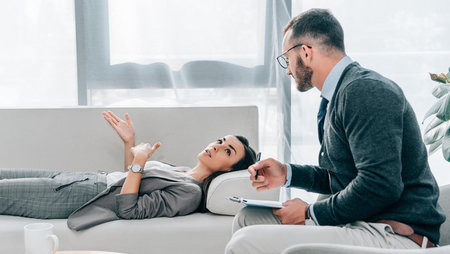 Male psychologist with female patient