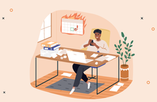 A man sitting at a desk trying to stop procrastinating